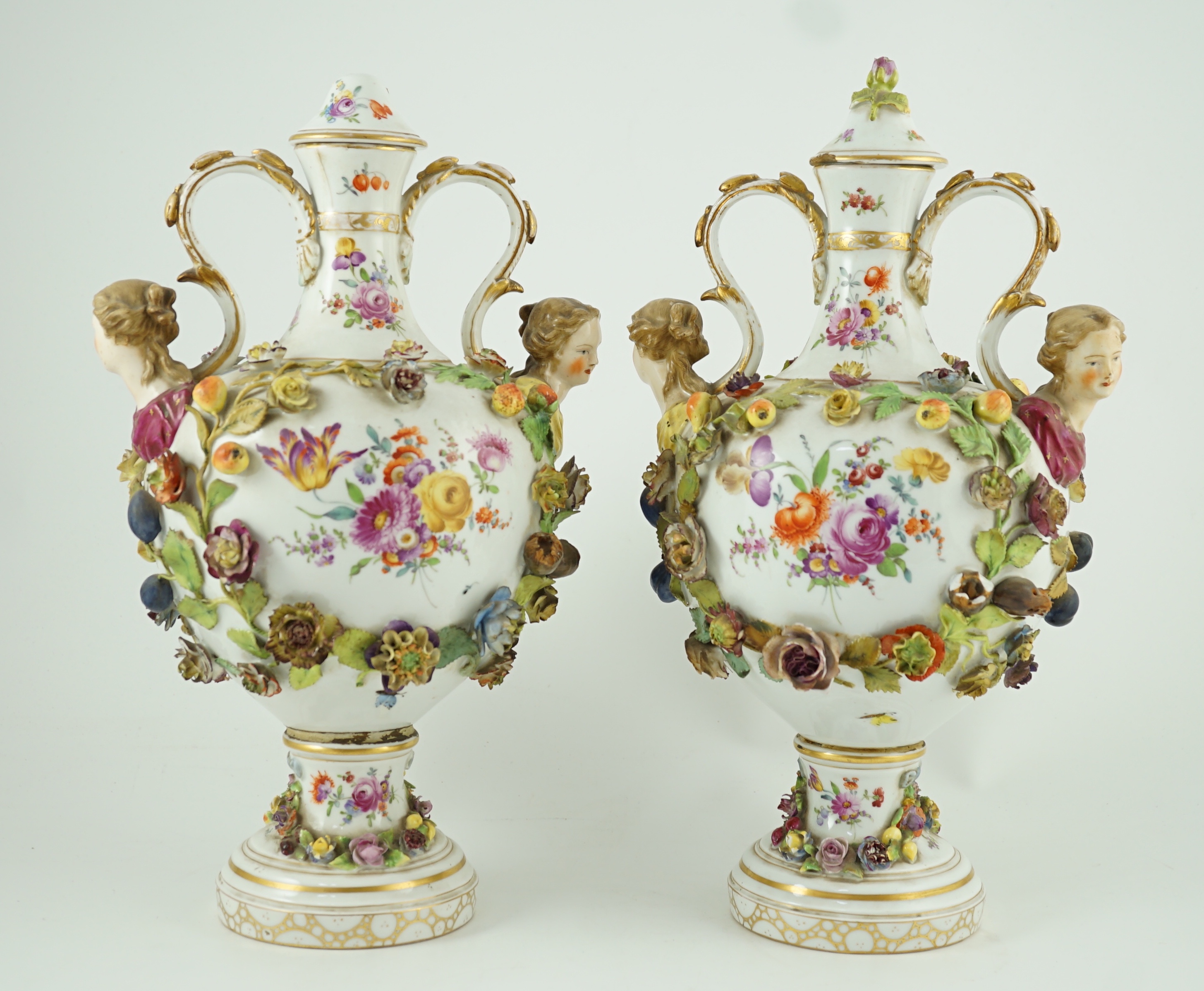 A pair of Potschappel porcelain vases and cover, late 19th century, 41cm high, slight damage